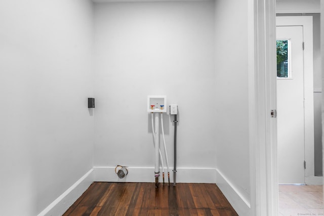 clothes washing area featuring hookup for a washing machine and dark hardwood / wood-style flooring