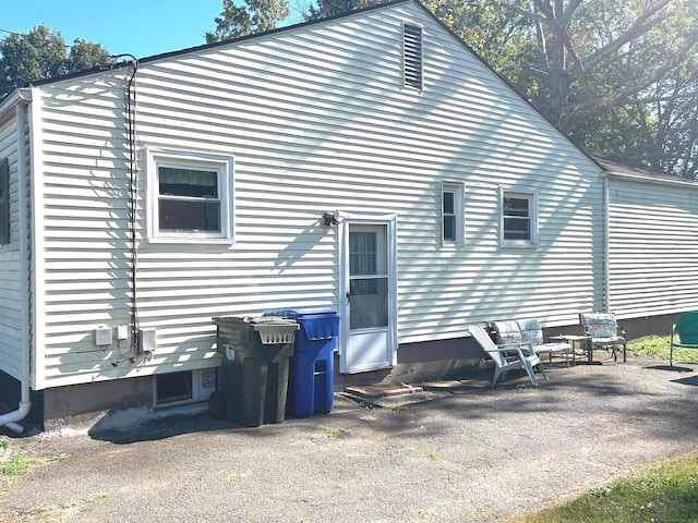 back of house featuring a patio area