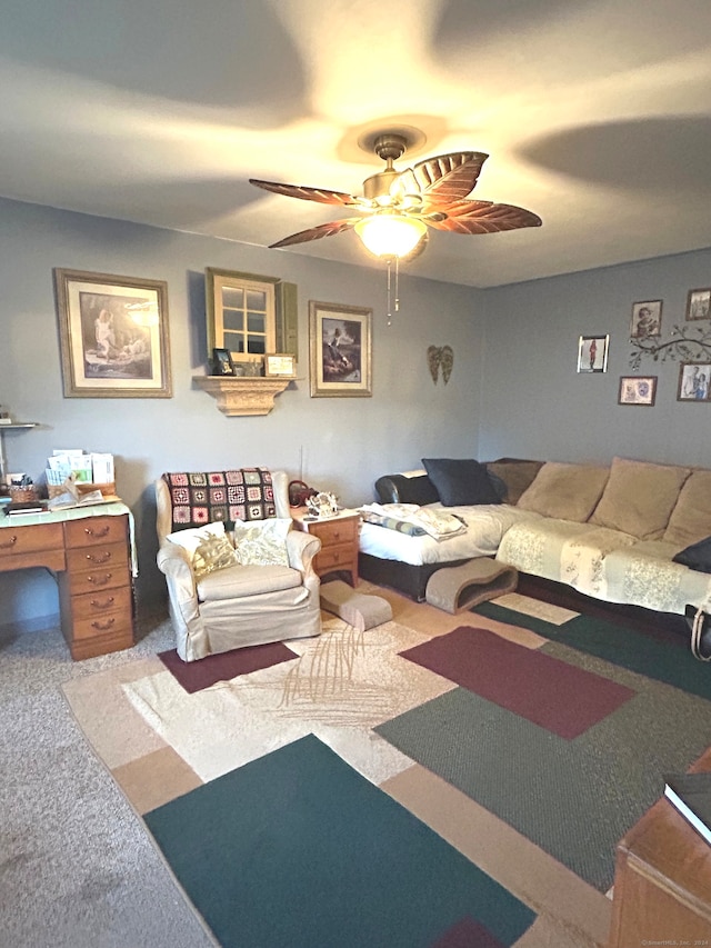 living room featuring carpet and ceiling fan