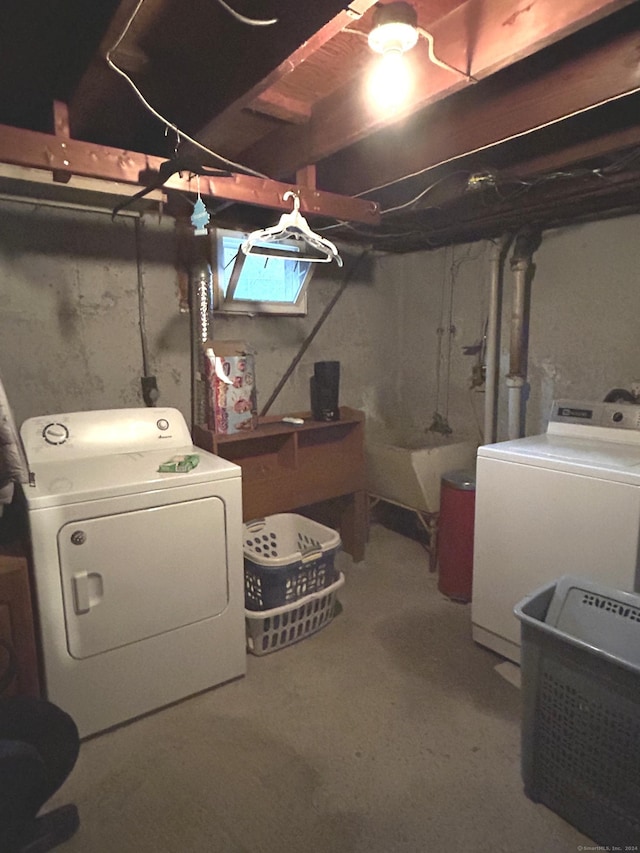 14 8th St, Newington, CT 06111 - unfinished basement featuring washing machine and dryer and a sink