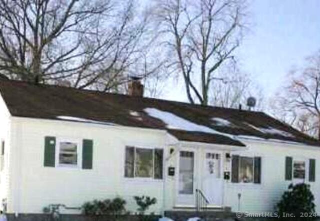 14 8th St, Newington, CT 06111 - view of front of home featuring a chimney