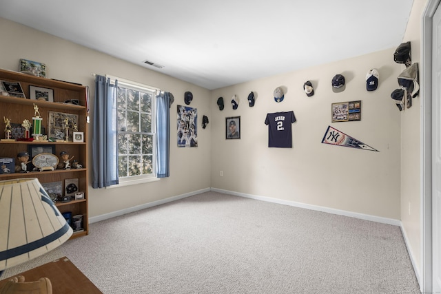 miscellaneous room with light carpet