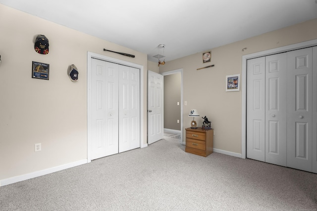 unfurnished bedroom with light carpet