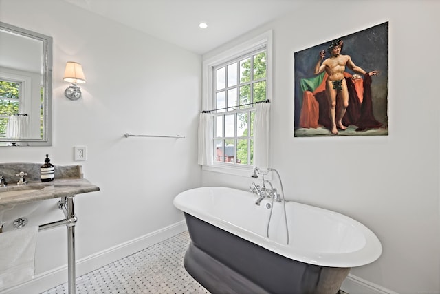 429 Chestnut Land Rd, New Milford, CT 06776 - full bath featuring baseboards, recessed lighting, tile patterned floors, a freestanding bath, and a sink