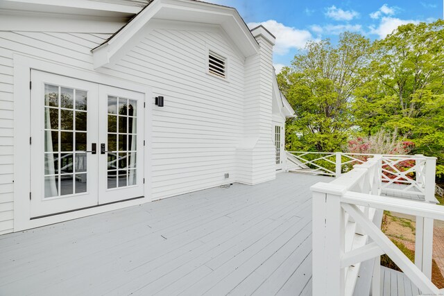 429 Chestnut Land Rd, New Milford, CT 06776 - wooden terrace with french doors