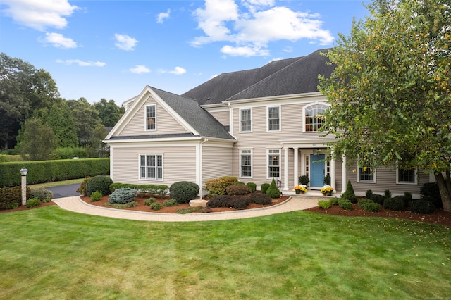 view of front of home with a front yard