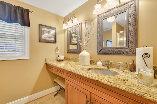 bathroom featuring tile patterned floors and vanity