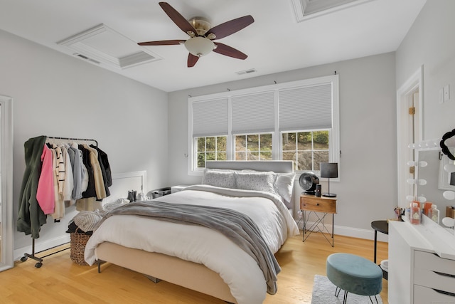 bedroom with light wood-type flooring and ceiling fan