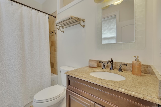 full bathroom featuring vanity, toilet, and shower / tub combo