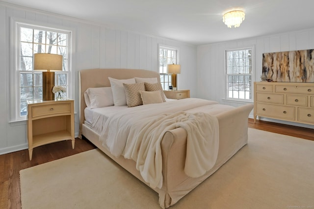 bedroom featuring wood finished floors