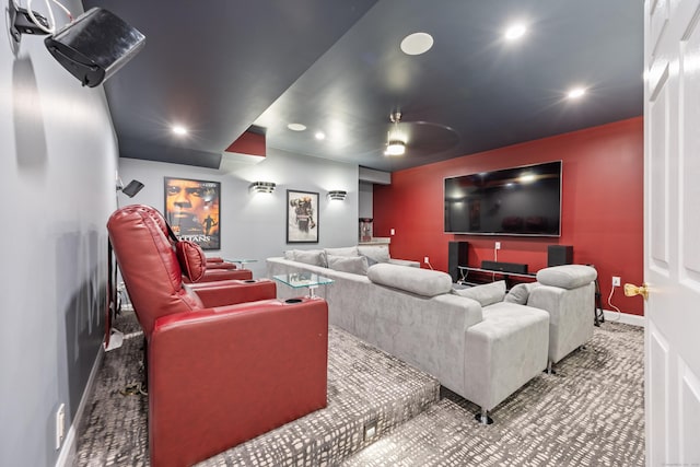 home theater room featuring ceiling fan