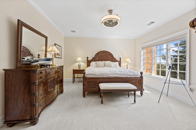 bedroom featuring ornamental molding and light colored carpet