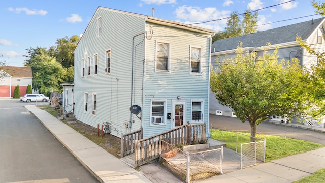 view of front of home with cooling unit