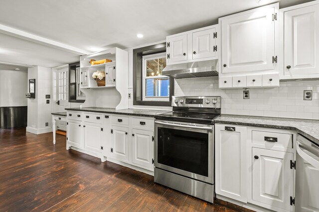 kitchen featuring stainless steel appliances, white cabinets, decorative backsplash, and dark wood-type flooring