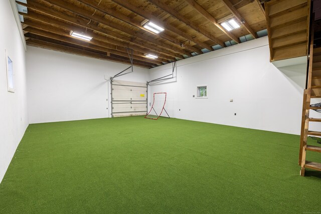 garage featuring wooden ceiling