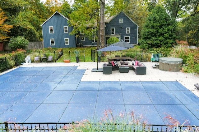 view of pool featuring an outdoor hangout area, a lawn, and a patio area