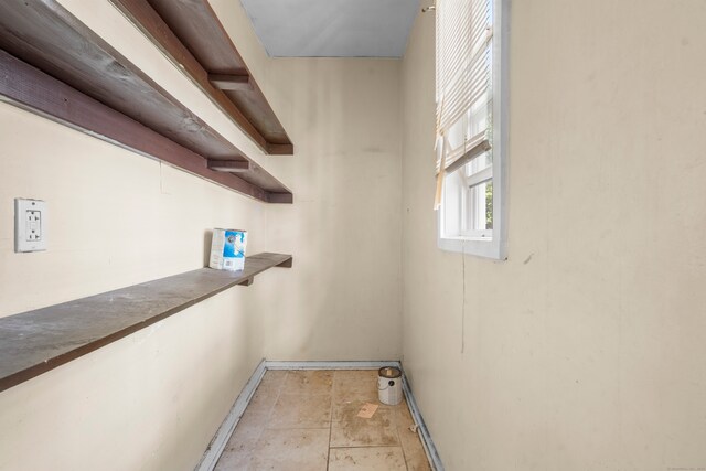 interior space featuring light tile patterned floors