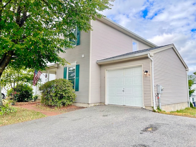 exterior space featuring a garage