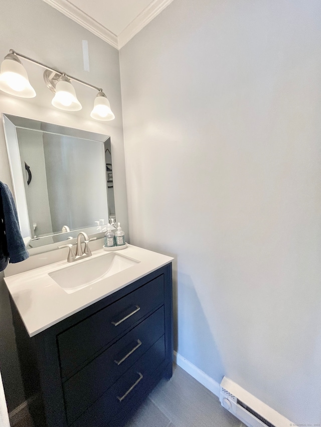 bathroom with vanity, a baseboard radiator, and ornamental molding