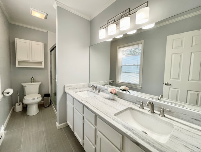 bathroom featuring an enclosed shower, crown molding, vanity, and toilet