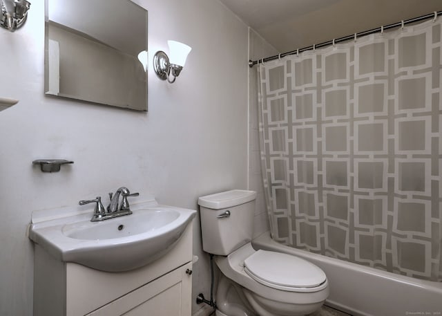 full bathroom featuring vanity, toilet, and shower / bath combo