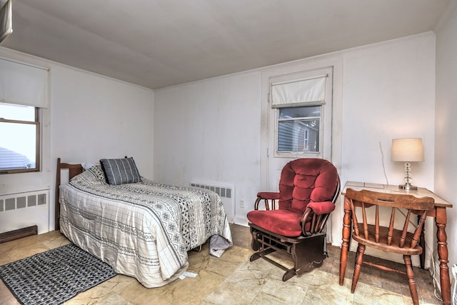 bedroom featuring radiator heating unit