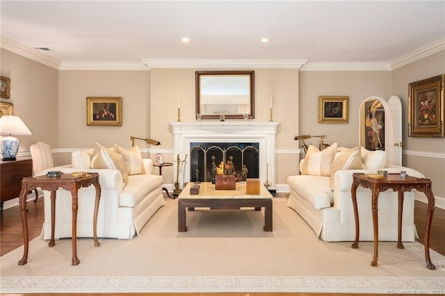 living room featuring light hardwood / wood-style flooring and ornamental molding