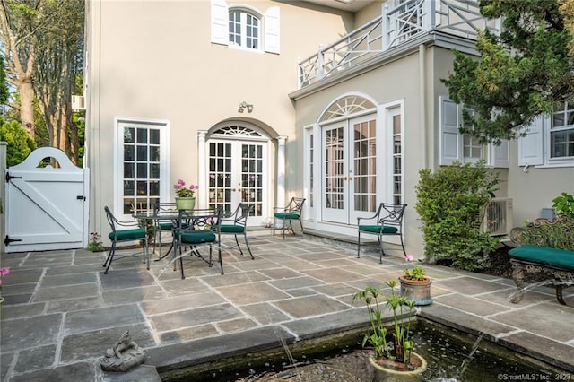 view of patio / terrace featuring french doors