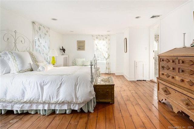 bedroom featuring light hardwood / wood-style floors