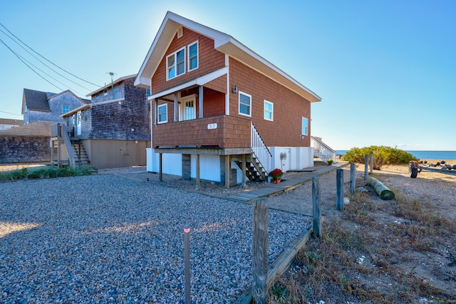 view of side of property with a garage