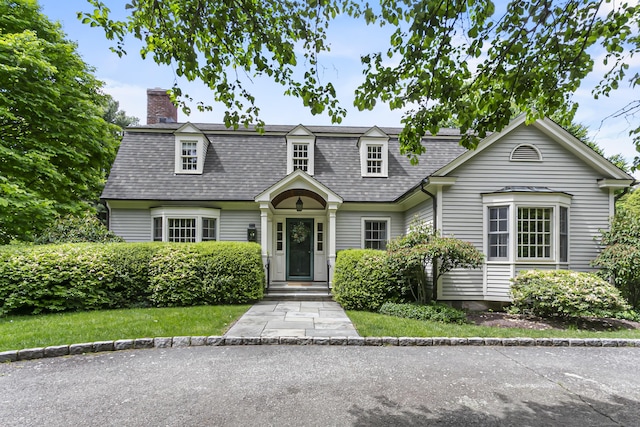 91 Open Gate Ln, Fairfield, CT 06890 - view of front of property featuring a chimney and a shingled roof