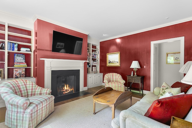 91 Open Gate Ln, Fairfield, CT 06890 - living room with a fireplace with flush hearth, crown molding, wood finished floors, and built in features