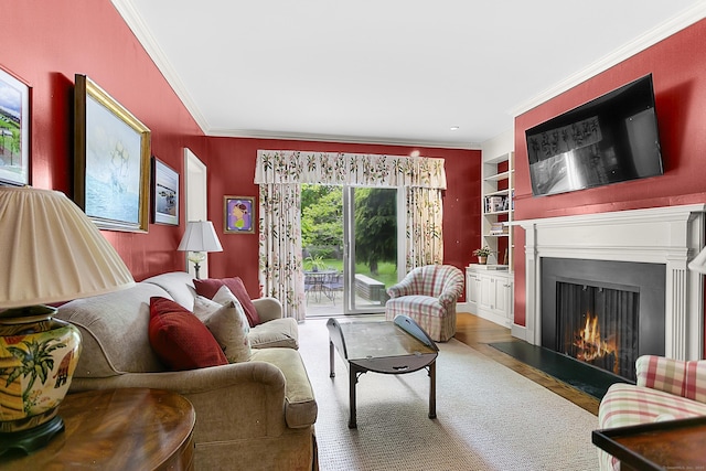 91 Open Gate Ln, Fairfield, CT 06890 - living room featuring a fireplace with flush hearth, ornamental molding, built in features, and wood finished floors