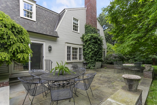 91 Open Gate Ln, Fairfield, CT 06890 - view of patio / terrace featuring outdoor dining space