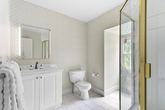 91 Open Gate Ln, Fairfield, CT 06890 - bathroom featuring vanity, toilet, a shower stall, tile patterned floors, and baseboards