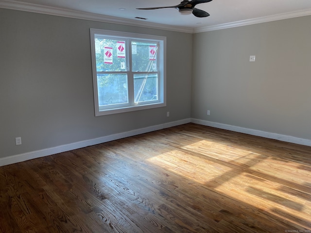 unfurnished room featuring hardwood / wood-style floors, ceiling fan, and crown molding