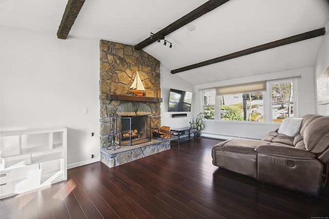 living room featuring a stone fireplace, lofted ceiling with beams, baseboards, and wood finished floors