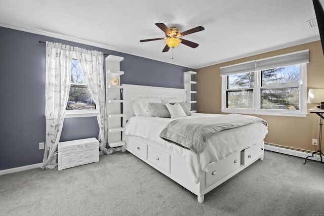 carpeted bedroom with a baseboard radiator, baseboards, and ceiling fan