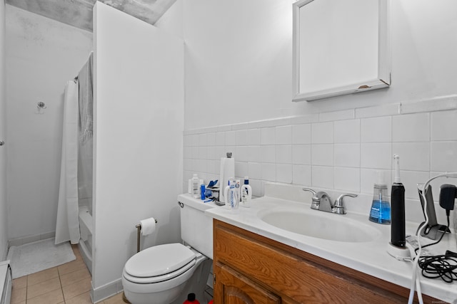 full bathroom with tile patterned flooring, toilet, a baseboard radiator, shower / bath combination with curtain, and vanity