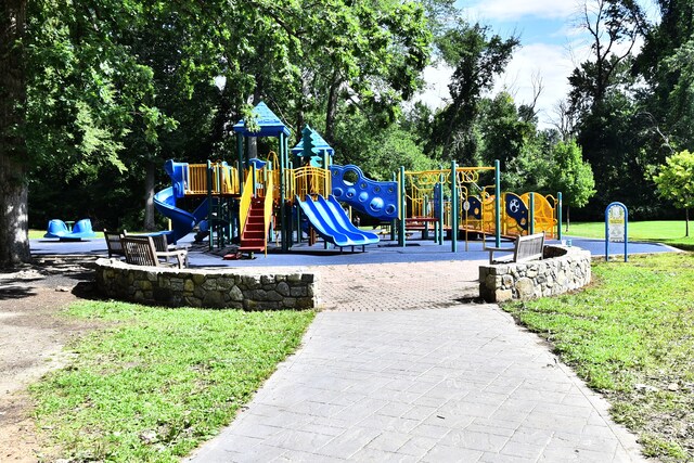 view of jungle gym with a yard