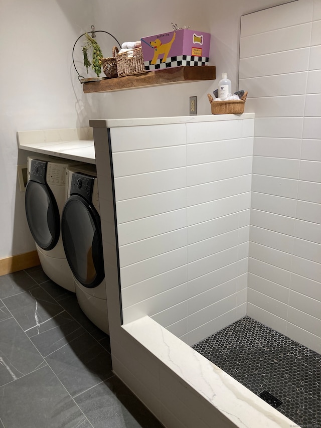 laundry room with washer and dryer