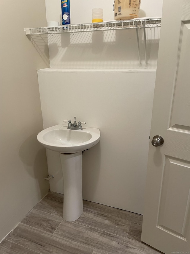 bathroom featuring hardwood / wood-style flooring