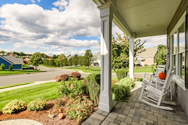 view of patio featuring a porch