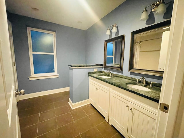 bathroom featuring tile patterned floors and vanity