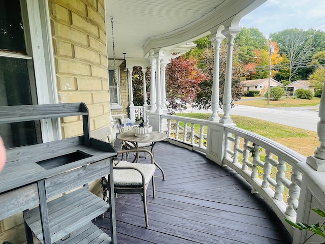 wooden deck featuring a porch