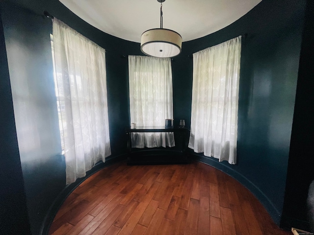 spare room featuring hardwood / wood-style flooring