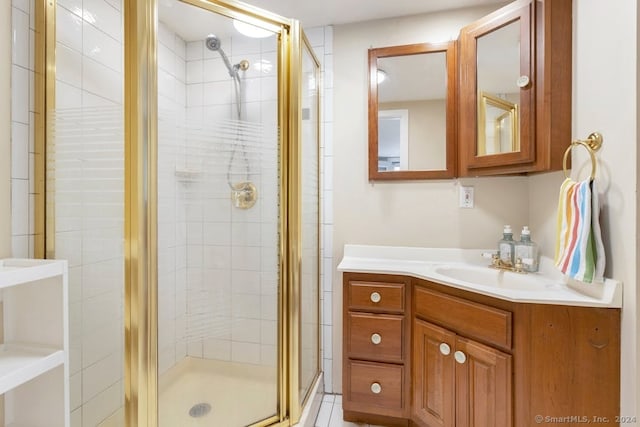 bathroom with vanity and an enclosed shower