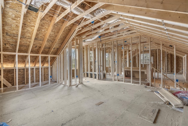 misc room with lofted ceiling