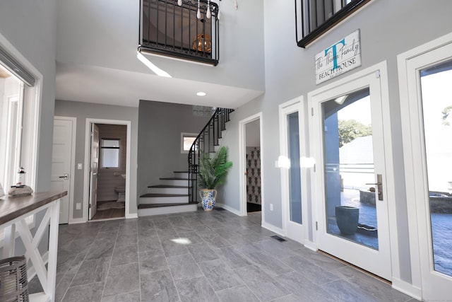 372 Maple Ave, Old Saybrook, CT 06475 - foyer entrance with stairway and a high ceiling