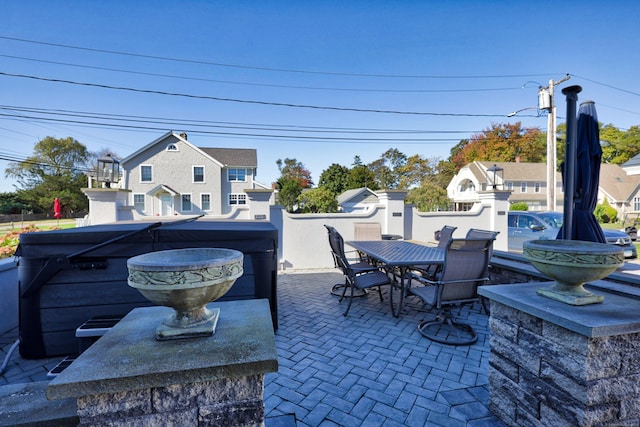 372 Maple Ave, Old Saybrook, CT 06475 - patio / terrace with outdoor dining space and a hot tub